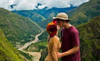 Inka Jungle Tour Premium panoramic view of the Machu Picchu archaeological site under dramatic sky