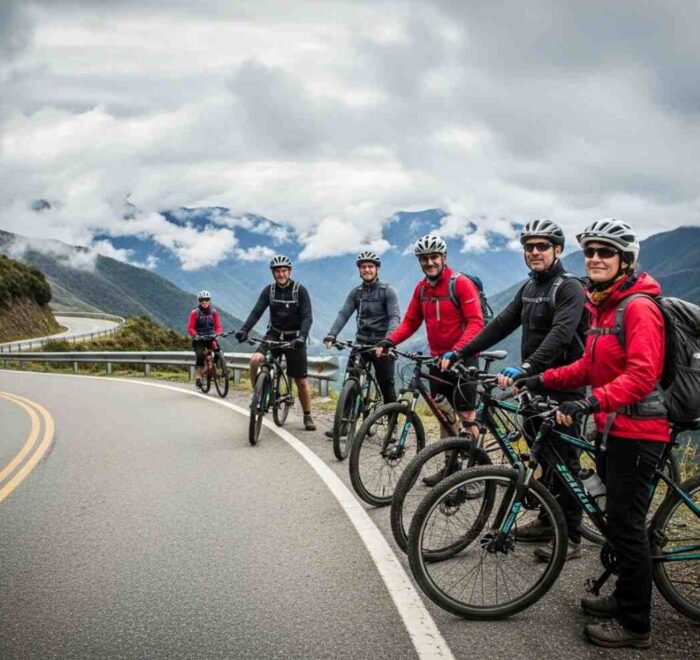 Un ciclista evaluando el nivel de dificultad del Inka Jungle mientras desciende por la sinuosa carretera del Abra Málaga